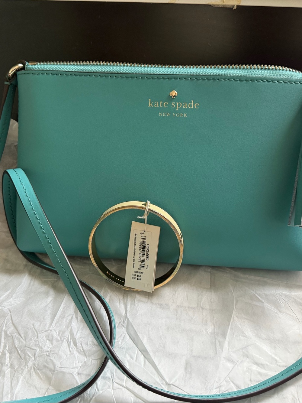🍁🍁🍁kate spade turquoise crossbody with tassel Plus free bracelet Kate spade ♠️